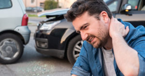 Car accident victim suffering from a neck injury in Tarpon Springs, Florida.