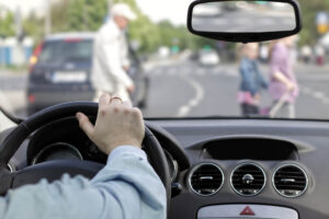 Pedestrians passing at a crosswalk from drivers view