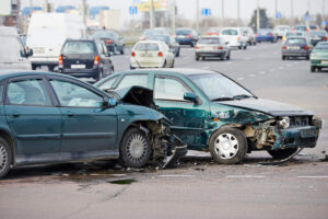 Car crash in the center of the highway.